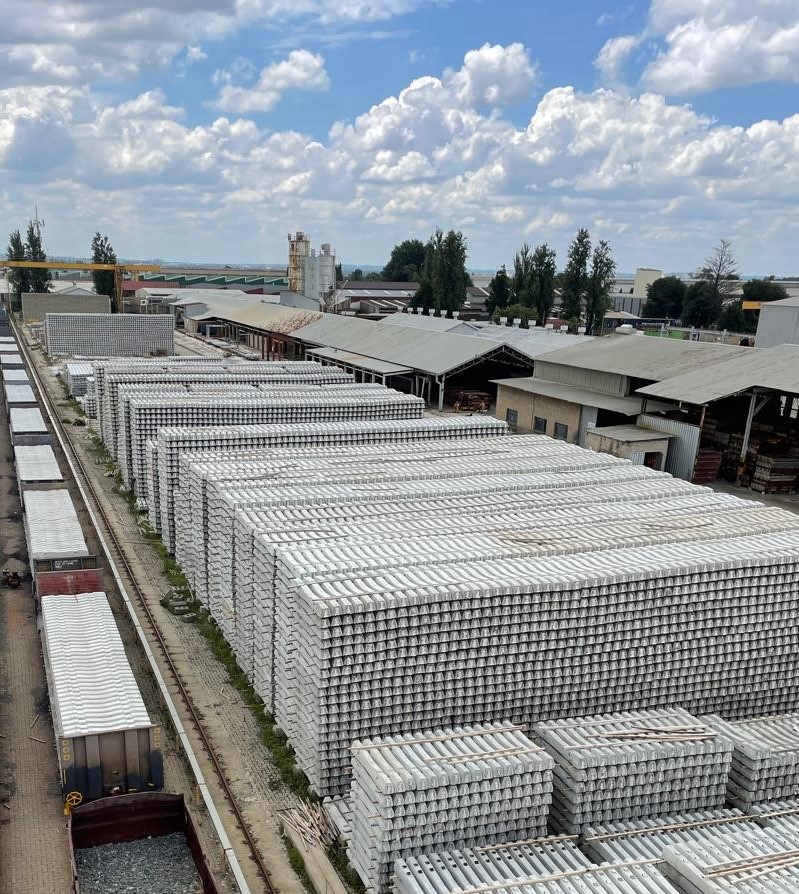 Stacked railway sleepers at Colossal’s Brakpan manufacturing facility