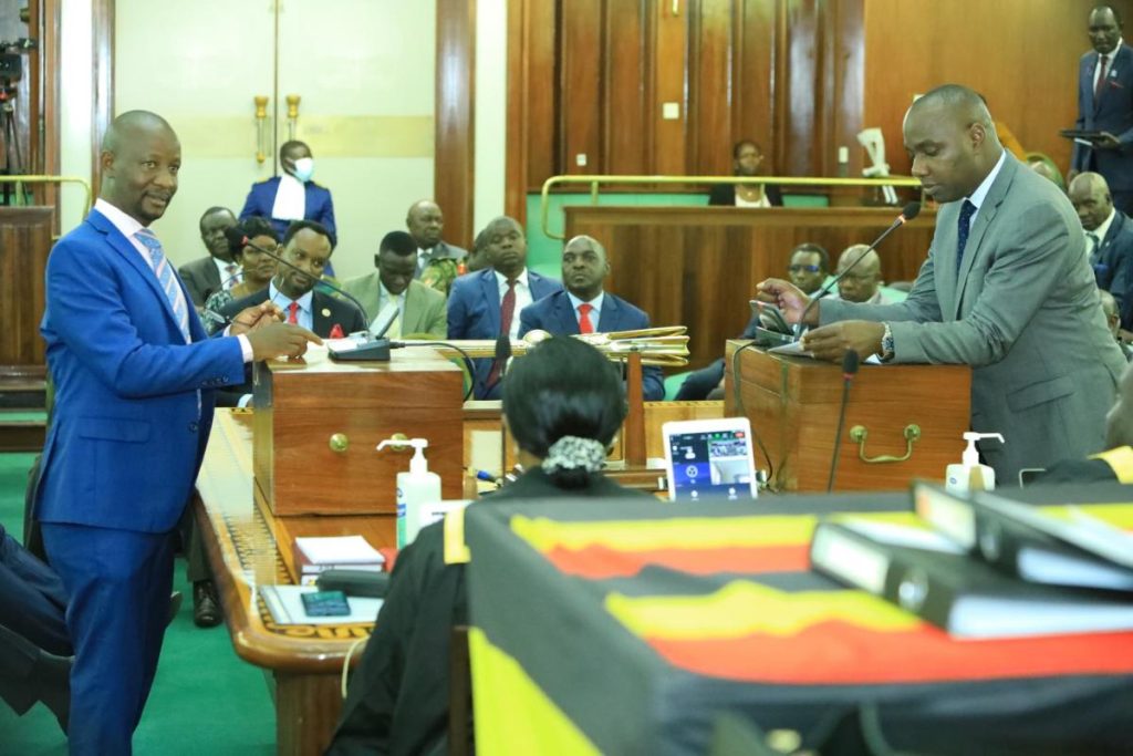 Hon. Ssemujju Ibrahim Nganda (L) and Minister Henry Musasizi