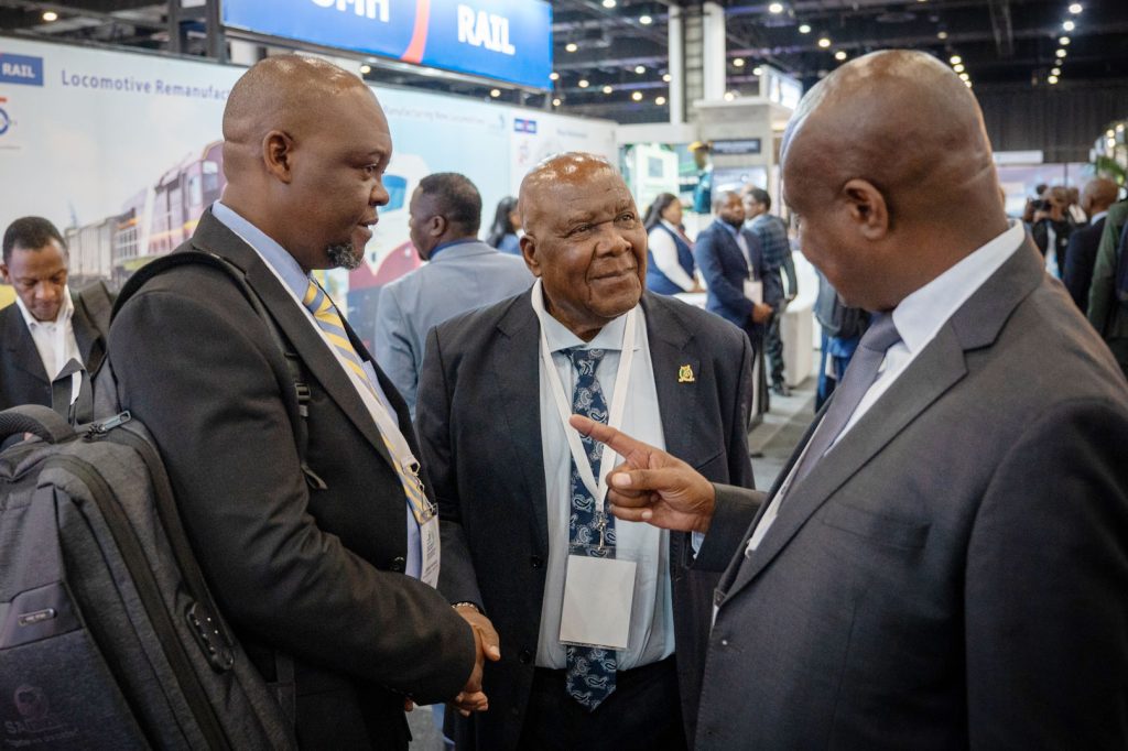Dr. Lubinda Sakanga greets Zambia Railways Limited chairperson, Emmanuel Hachipuka at the 2024 SARA Rail Conference and Exhibition. (Photo: Railways Africa / Craig Dean)