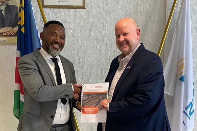 Photo - TransNamib - RSR Chief Executive Officer Brian Monakali and TransNamib Chief Executive Officer Desmond van Jaarsveld.